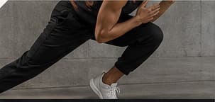 A gym-goer moving through a controlled training exercise
