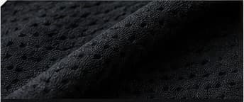 Close-up texture of breathable black performance fabric